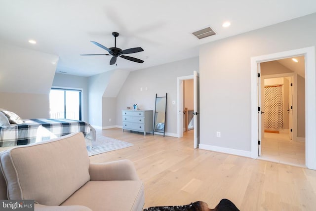 bedroom with ceiling fan and light wood-type flooring