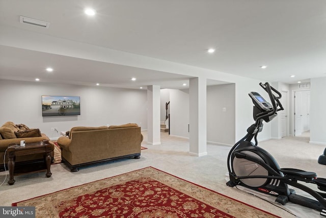 workout room with light colored carpet