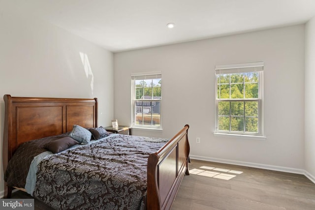 bedroom featuring light hardwood / wood-style floors