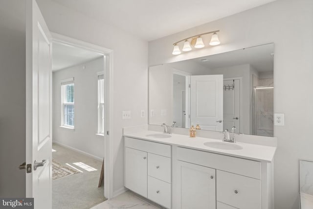 bathroom with vanity and an enclosed shower