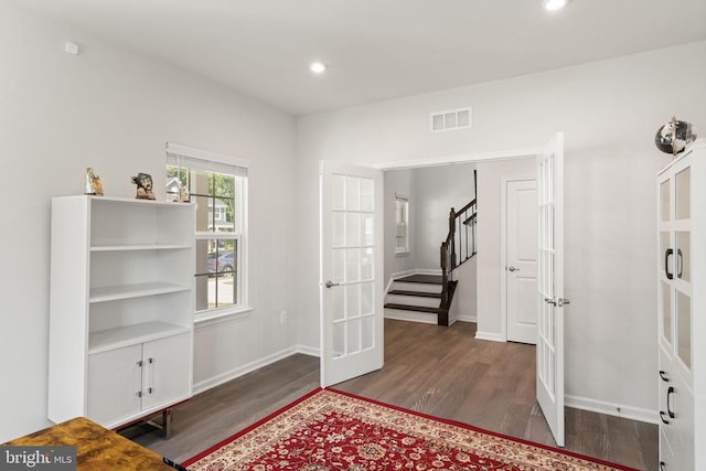 interior space with dark wood-type flooring