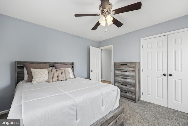 bedroom with a closet, carpet flooring, and ceiling fan