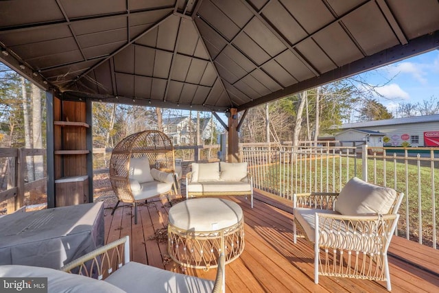 deck with an outdoor hangout area and a gazebo