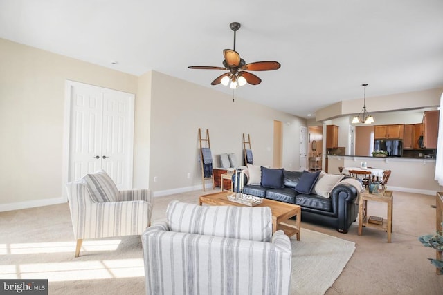 living room featuring ceiling fan and light carpet