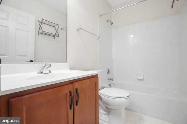 full bathroom featuring vanity, tile patterned flooring, toilet, and washtub / shower combination