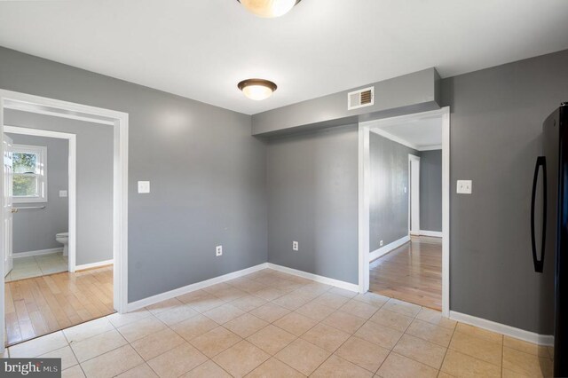 view of tiled spare room