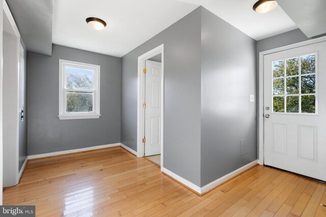 entrance foyer featuring light hardwood / wood-style floors