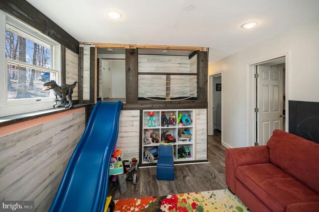 recreation room with recessed lighting and wood finished floors