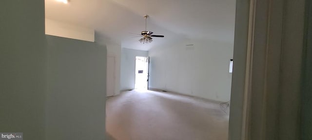 spare room with lofted ceiling and ceiling fan