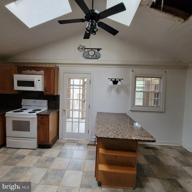 kitchen featuring brown cabinetry, plenty of natural light, white appliances, and open shelves