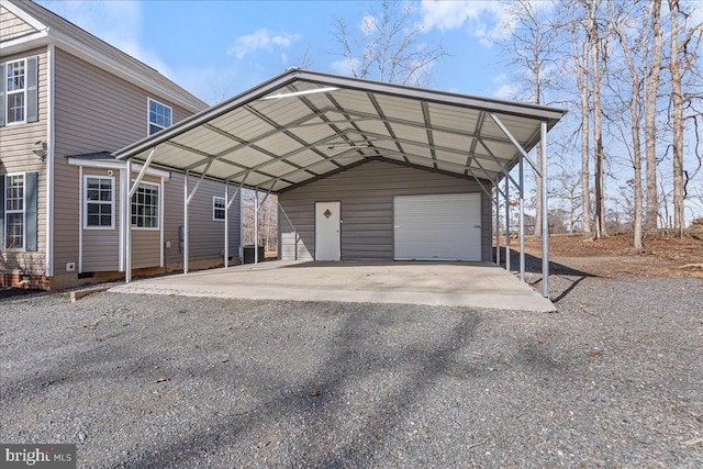 view of car parking featuring a garage