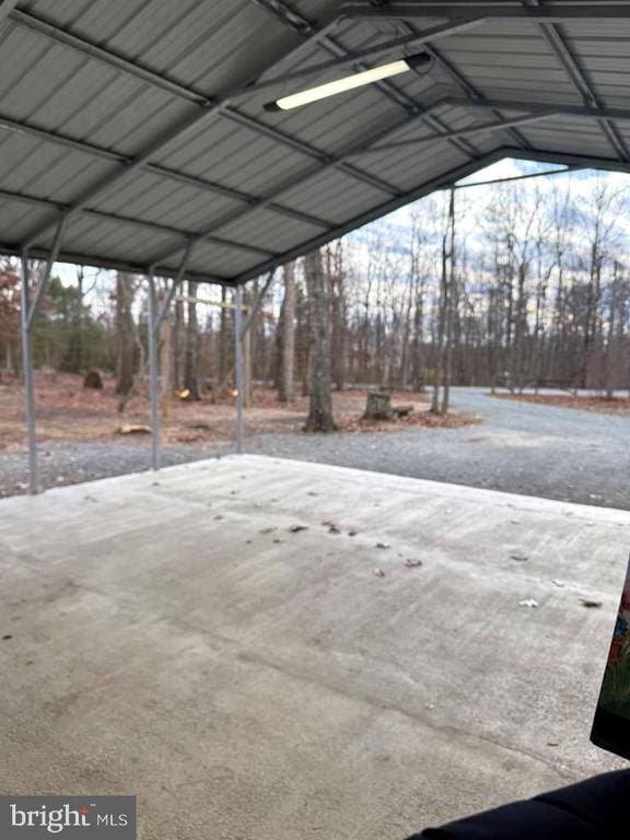 exterior space featuring a carport