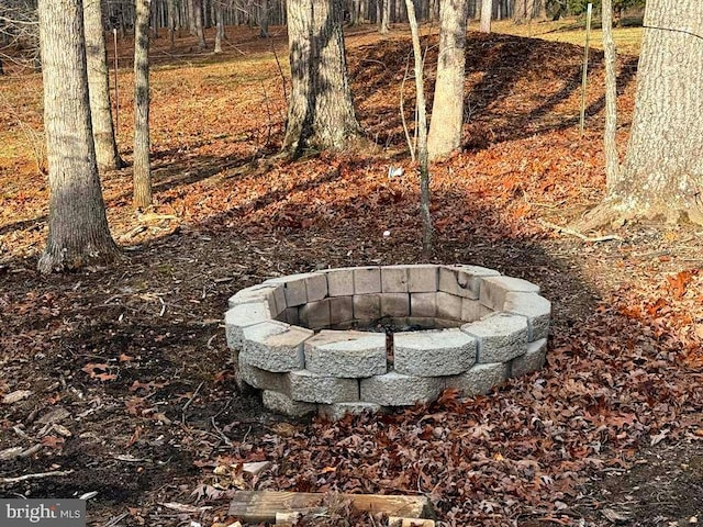 exterior details with a fire pit