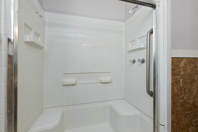 bathroom with an enclosed shower