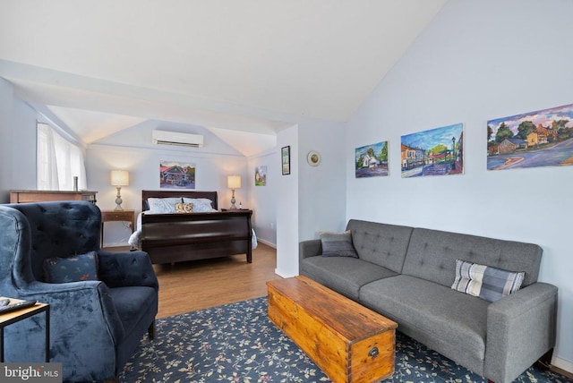 living room with hardwood / wood-style floors, lofted ceiling, and a wall mounted AC