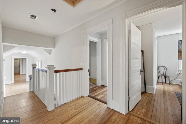 hall featuring light hardwood / wood-style flooring