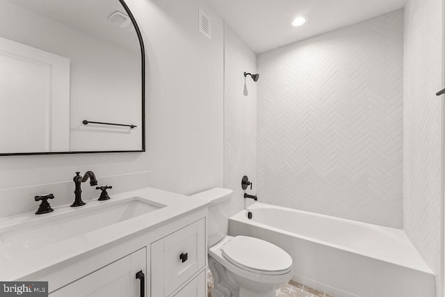 bathroom featuring vanity, toilet, visible vents, and shower / bath combination