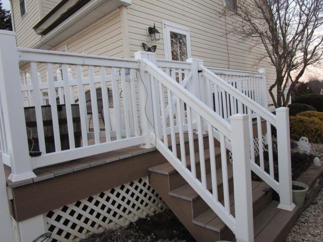 deck featuring stairway