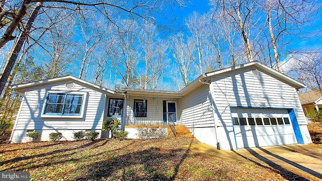 ranch-style house featuring covered porch