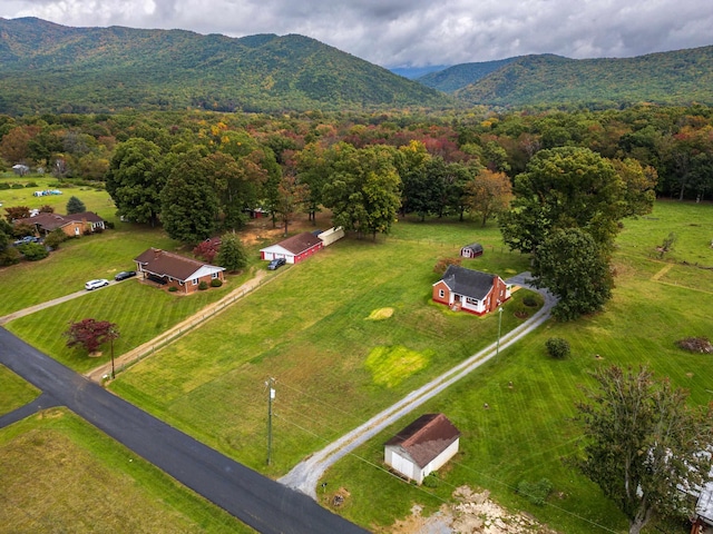 drone / aerial view featuring a mountain view and a rural view