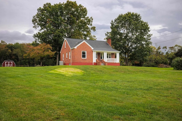 exterior space featuring a porch and a front yard