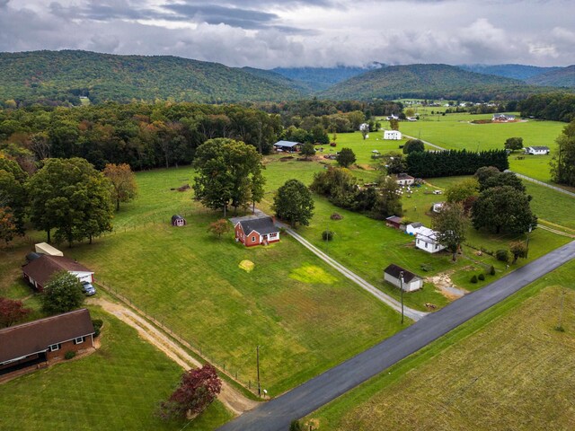 bird's eye view with a mountain view and a rural view