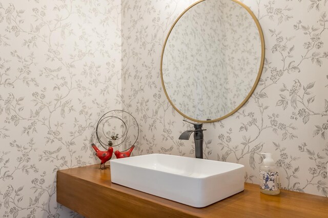 bathroom with hardwood / wood-style flooring and vanity