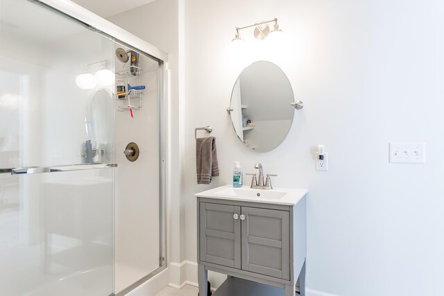 bathroom featuring vanity and walk in shower