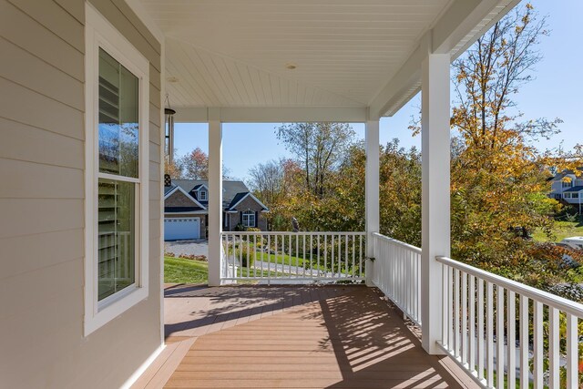 wooden terrace featuring a porch