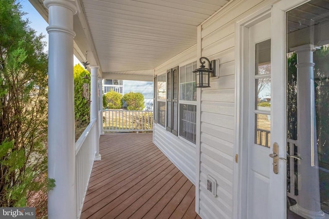 wooden deck featuring a porch