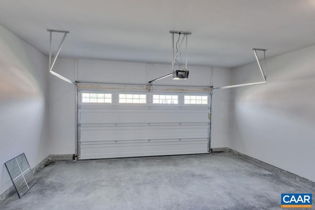 garage featuring a garage door opener