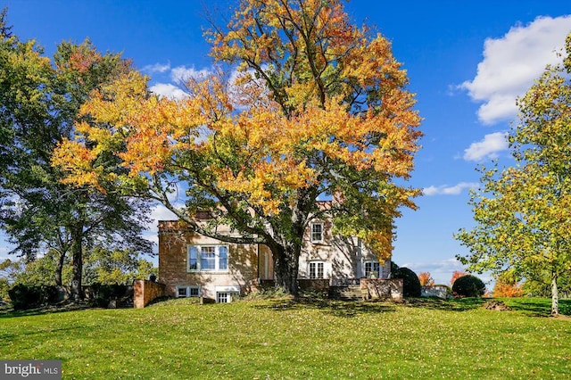 exterior space with a front yard