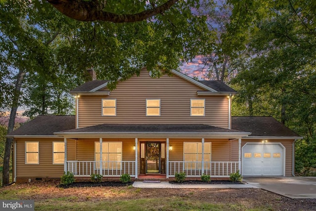 view of front of property with a garage, concrete driveway, a chimney, crawl space, and a porch