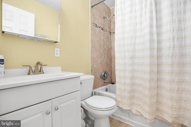 full bath featuring tile patterned floors, vanity, toilet, and shower / tub combo