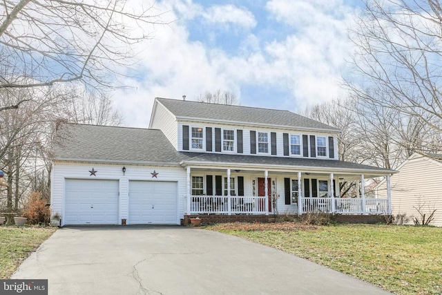 view of front of house with driveway, a porch, a shingled roof, a front yard, and an attached garage