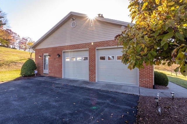 view of side of property with a garage