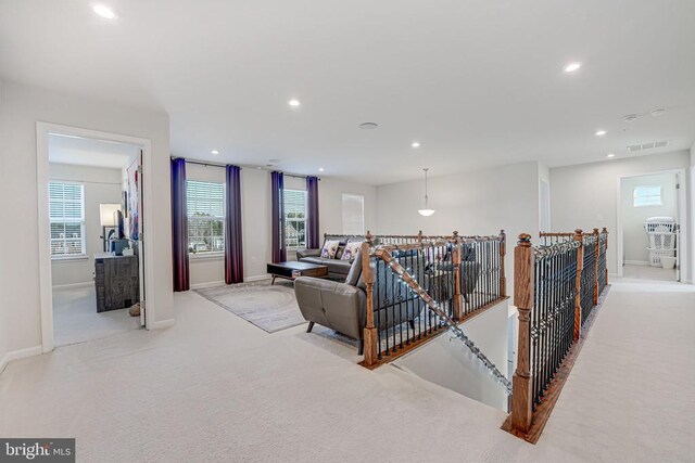 living room with light carpet