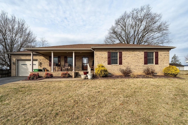 single story home featuring a porch, crawl space, brick siding, and aphalt driveway