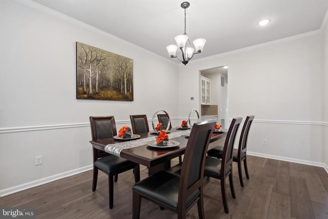 dining room featuring an inviting chandelier, crown molding, baseboards, and dark wood-style flooring