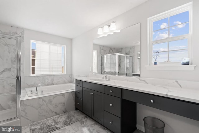 full bath featuring marble finish floor, vanity, a marble finish shower, and a bath