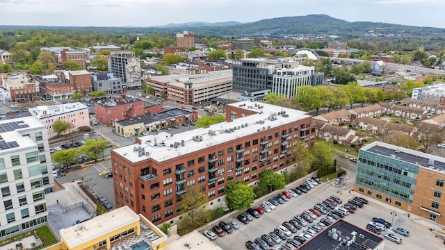 drone / aerial view with a city view and a mountain view
