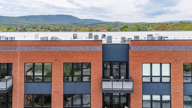 view of building exterior with a mountain view