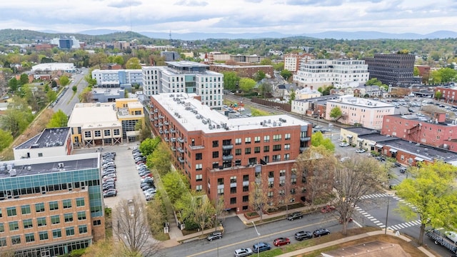 aerial view with a view of city and a mountain view