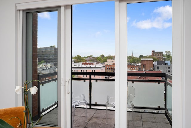 doorway to outside with plenty of natural light and a view of city
