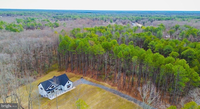 aerial view with a wooded view