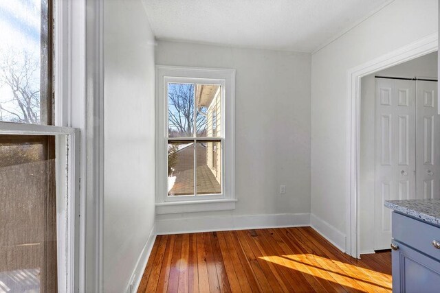 unfurnished dining area with light hardwood / wood-style floors