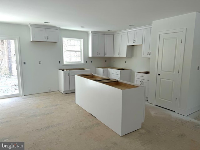 kitchen featuring white cabinetry and a center island