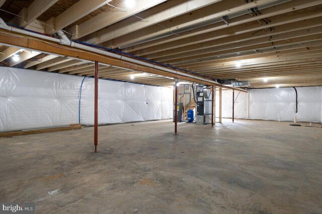 basement featuring heating unit