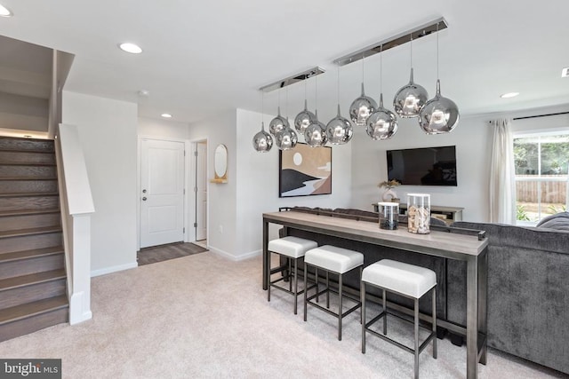 view of carpeted dining space