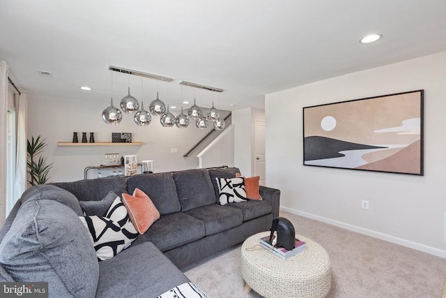 living room with light colored carpet